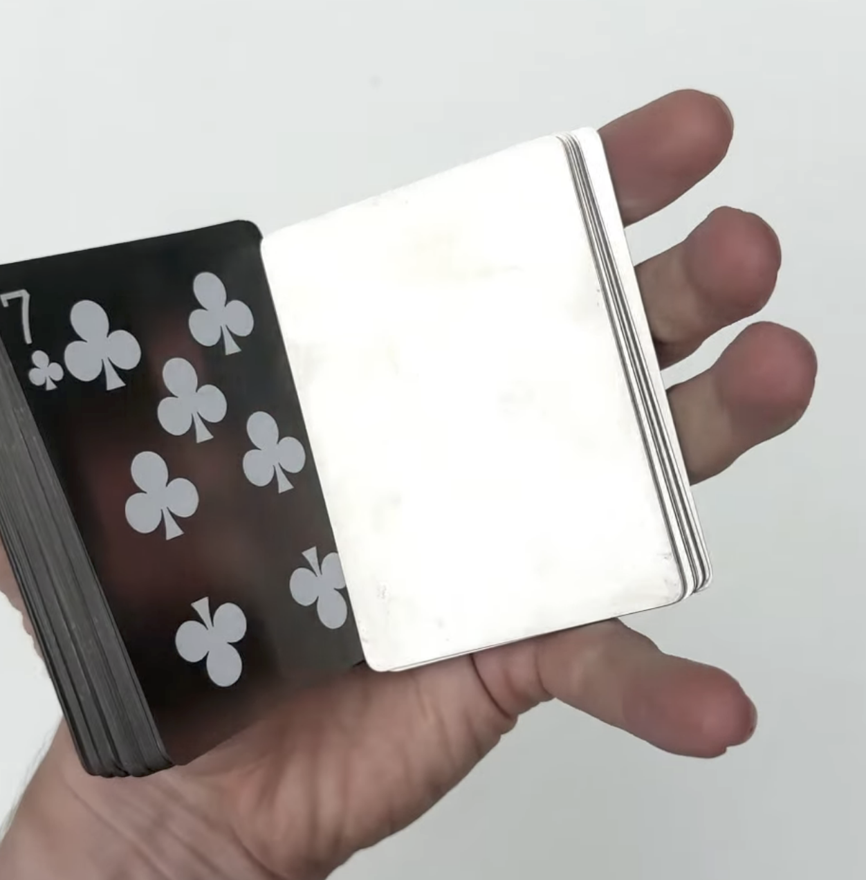 Steel Deck — deck held in hand
